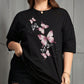 CAMISETA NEGRA DAMA MARIPOSAS LILA