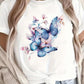 CAMISETA DAMA BLANCA MARIPOSAS AZULES