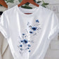 CAMISETA DAMA BLANCA FLORES AZULES