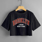 CAMISETA NEGRA CROP BROOKLYN 1898 NEW YORK